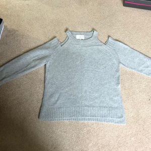 Light grey cold shoulder sweater.
